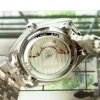 A Women's Silver Steel Band Luxury Business Style Calendar Display Tourbillon Fully Automatic Mechanical Watch 4